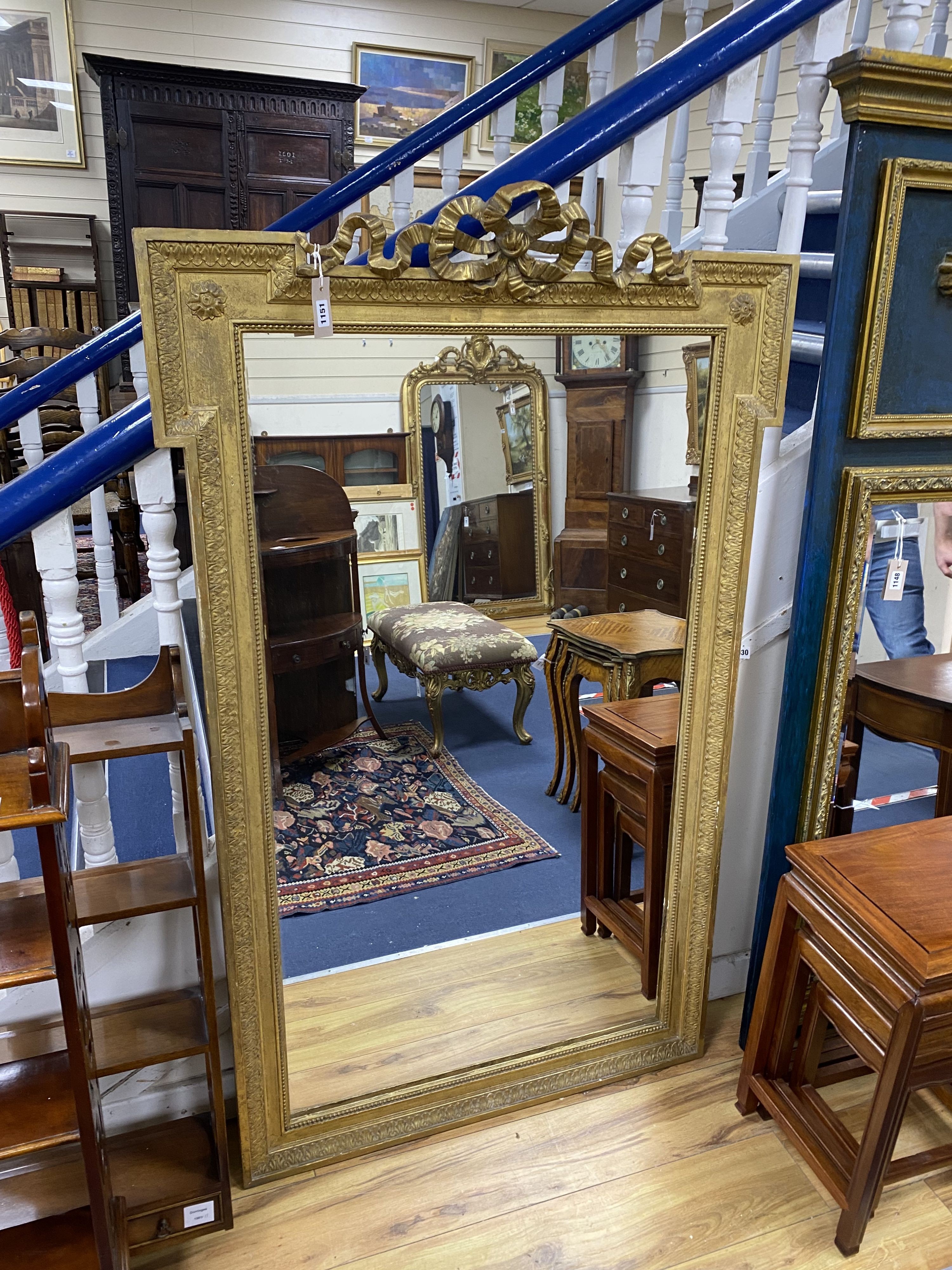 A gilt overmantel mirror, width 94cm, height 152cm